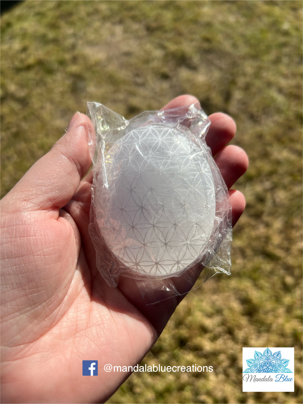Selenite flower of life palm stone